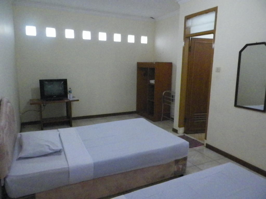 Hotel Puspa Sari Redpartner Чиатер Номер фото